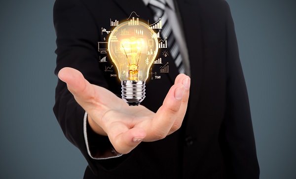 businessman-with-a-light-bulb-in-his-hand